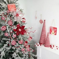 Northlight 30" Candy Cane Swirls and Pom Poms Christmas Garland