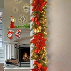 National Tree Company Pre-Lit Artificial Christmas Garland, Green, Evergreen, White Lights,Pine Cones, Ornaments, Poinsettia Flowers, Plug In,9 Feet