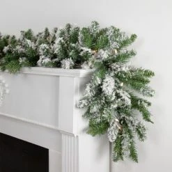 Northlight 9' x 10" Prelit Snow Mountain Pine Artificial Christmas Garland - Clear Lights