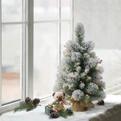 2ft Puleo Pre-Lit Flocked Tabletop Artificial Christmas Tree with Pine Cones Clear Lights