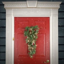 National Tree Company First Traditions Pre-Lit Artificial Holly Swag with Red Berries and Pinecones, Warm White LED Lights, Battery Operated, 2.5 ft