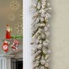 National Tree Company Pre-Lit 'Feel Real' Artificial Christmas Garland, Green, Sheffield Spruce, White Lights, With Frosted Branches, Plug In,9 Feet