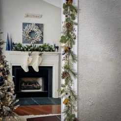 National Tree Company HGTV Home Collection 72" Unlit Swiss Chic Artificial Garland with Pinecones, Berries, Bells and Flexible Vine Base, Blue