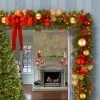National Tree Company 9 ft. Decorative Collection Cozy Christmas Garland with Red and Clear Lights -Outlet Xmas Decor Tree Store GUEST d1620f69 a032 47d2 969a 638a65c8afab