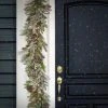 HGTV Home Collection 9ft Pre Lit Artificial Christmas Garland, Mixed Branch Tips , Decorated with Pinecones, Berries, Snowflakes, and Ornaments
