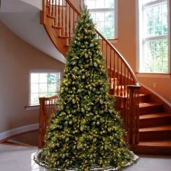 National Tree Company 12 ft Pre-Lit Artificial Giant Medium Christmas Tree, Green, Tiffany Fir, White Lights, Includes Stand